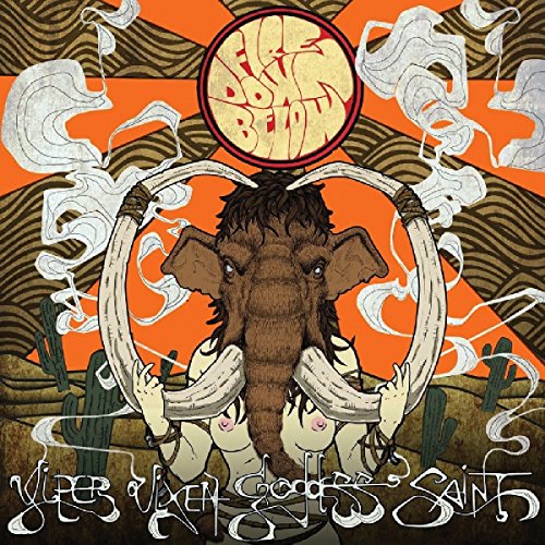 CD cover: mammoth skull with smoke, desert landscape, and orange background.