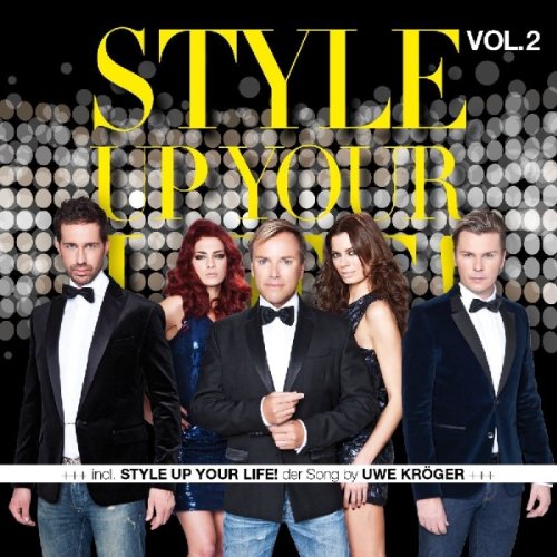 CD cover featuring five formally dressed people against a sparkly backdrop.