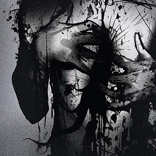 Black and white abstract portrait with splattered ink textures.