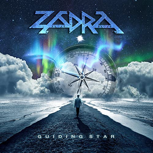 CD cover: compass, starry sky, lone figure on a beach path.