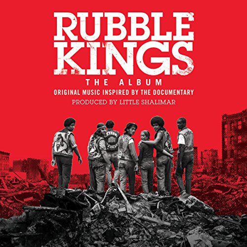 “Rubble Kings” album cover: group portrait over debris, red background.