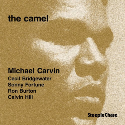 CD cover for Michael Carvin’s “The Camel” with a blurred face.