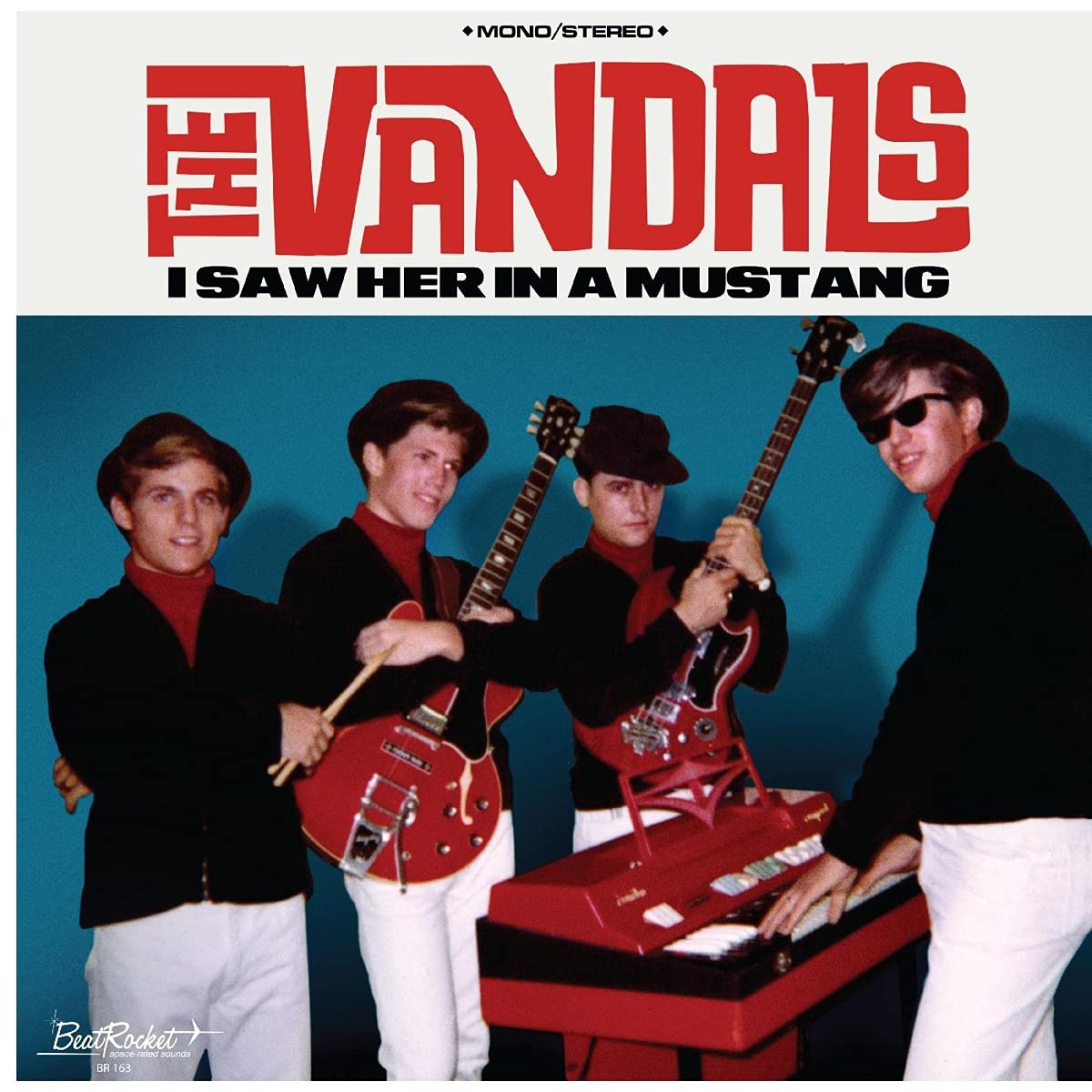 Album cover for The Vandals’ “I Saw Her In A Mustang” featuring four men with guitars.