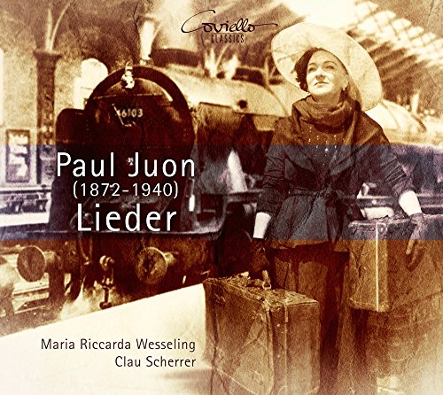 CD cover featuring a vintage photo of a woman by a train.