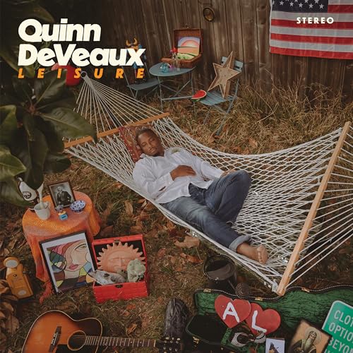 Album cover: man in hammock with art, guitar, and American flag.