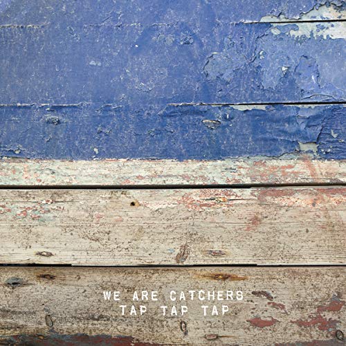 Vinyl record cover with distressed blue and wood plank texture.