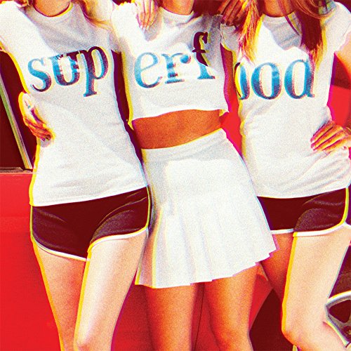 Three women in white shirts with “superfood” text, cropped image.