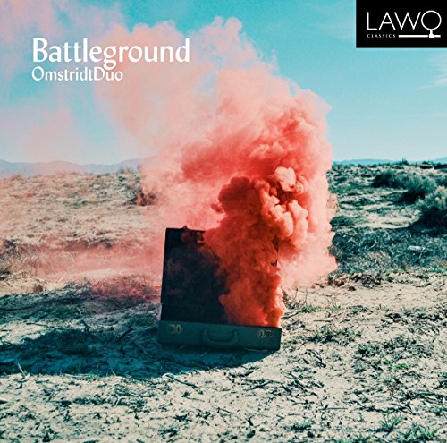 CD cover: open suitcase with red smoke rising from a desert landscape.