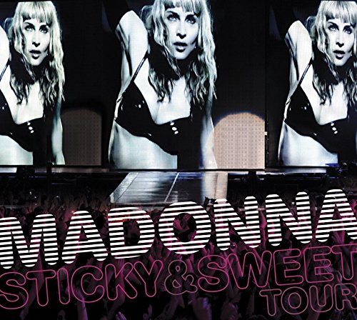 Madonna in a black bra, repeated on a concert tour album cover.