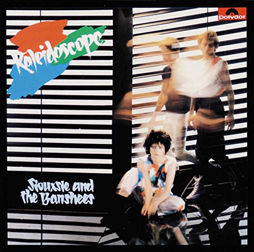 Album cover featuring Siouxsie and the Banshees against a background of horizontal window blinds.