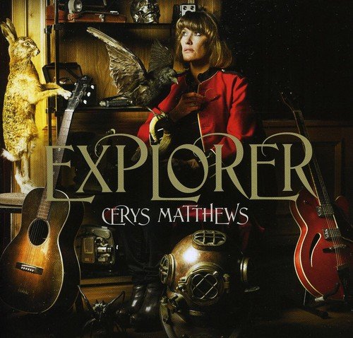 Cerys Matthews album cover with woman, instruments, and taxidermied animals.