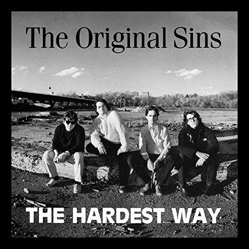 Black and white CD cover featuring a band of four people.