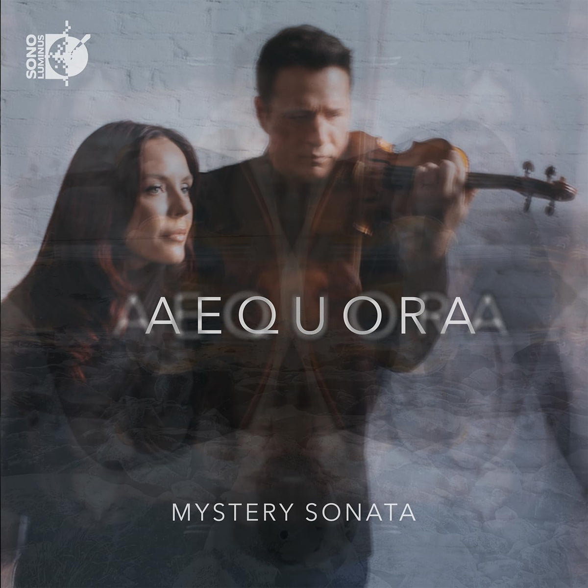 CD cover featuring a violinist with blurred, watery background text.
