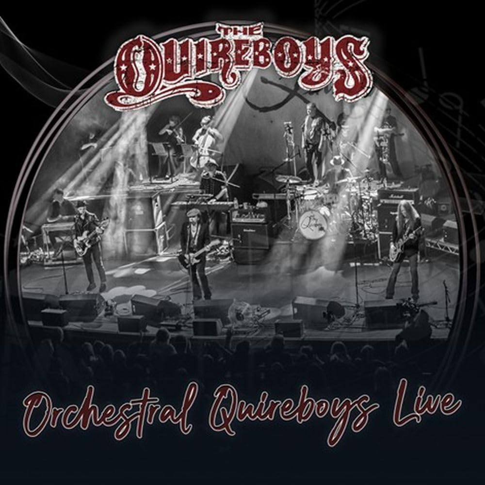 The Quireboys band performing live on stage, black and white image.