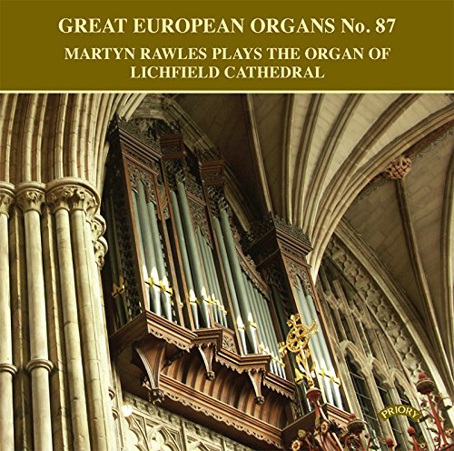 Pipe organ within a stone cathedral archway, CD cover art.