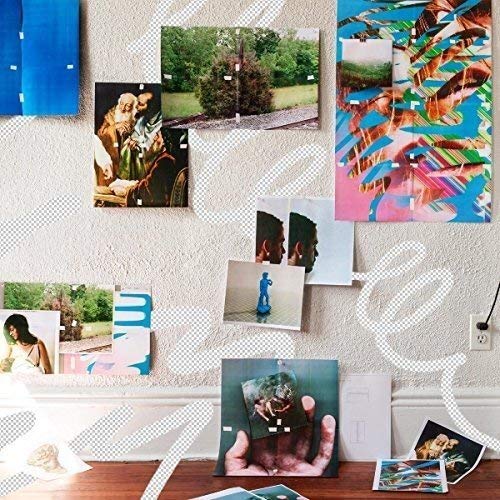 Album cover with collage of photos pinned to a textured wall.