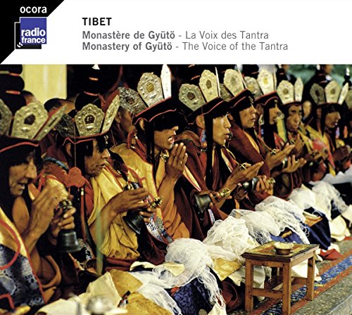 CD cover featuring Tibetan Buddhist monks in ceremonial dress playing instruments.