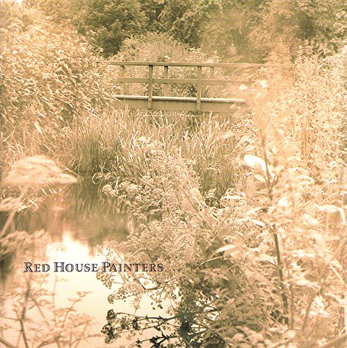Sepia-toned album cover depicting a small wooden bridge over water.