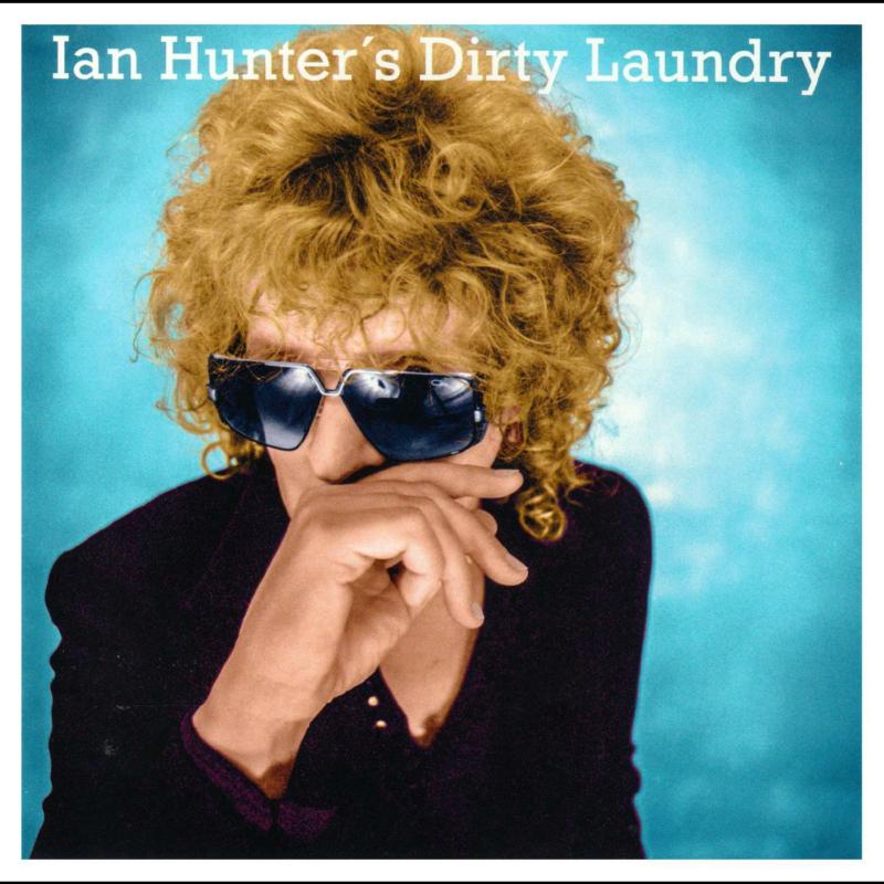 Ian Hunter album cover: portrait of a man with curly hair and sunglasses.