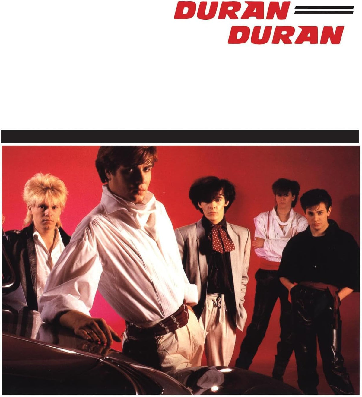 Duran Duran band portrait on a red background, 1980s style.