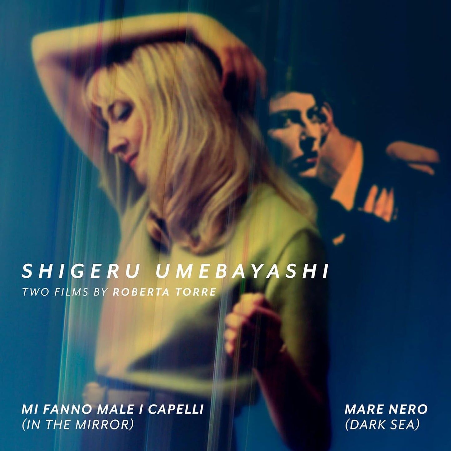 CD cover for Shigeru Umebayashi’s “In The Mirror” featuring a blurred face.