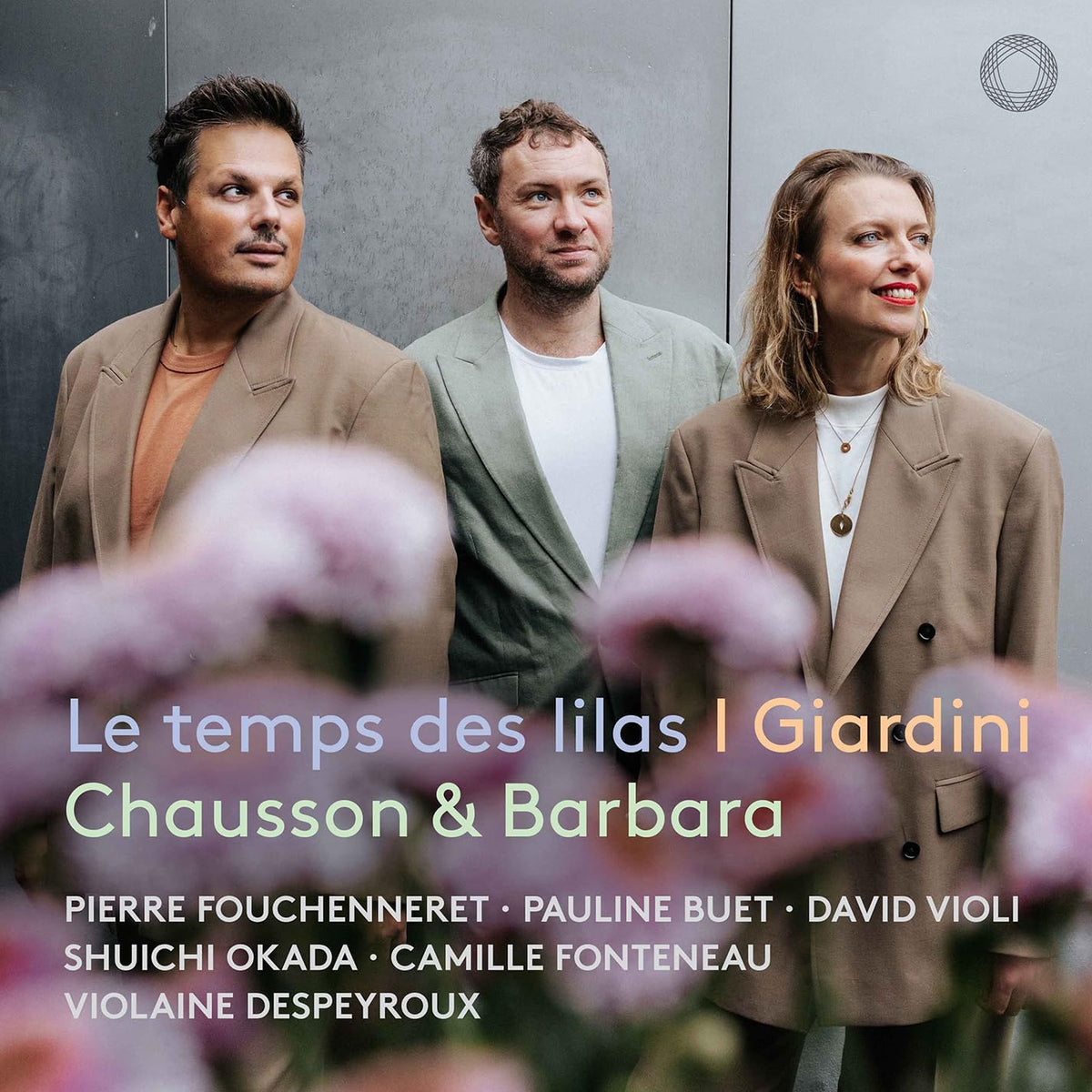 CD cover featuring three people and purple floral background.