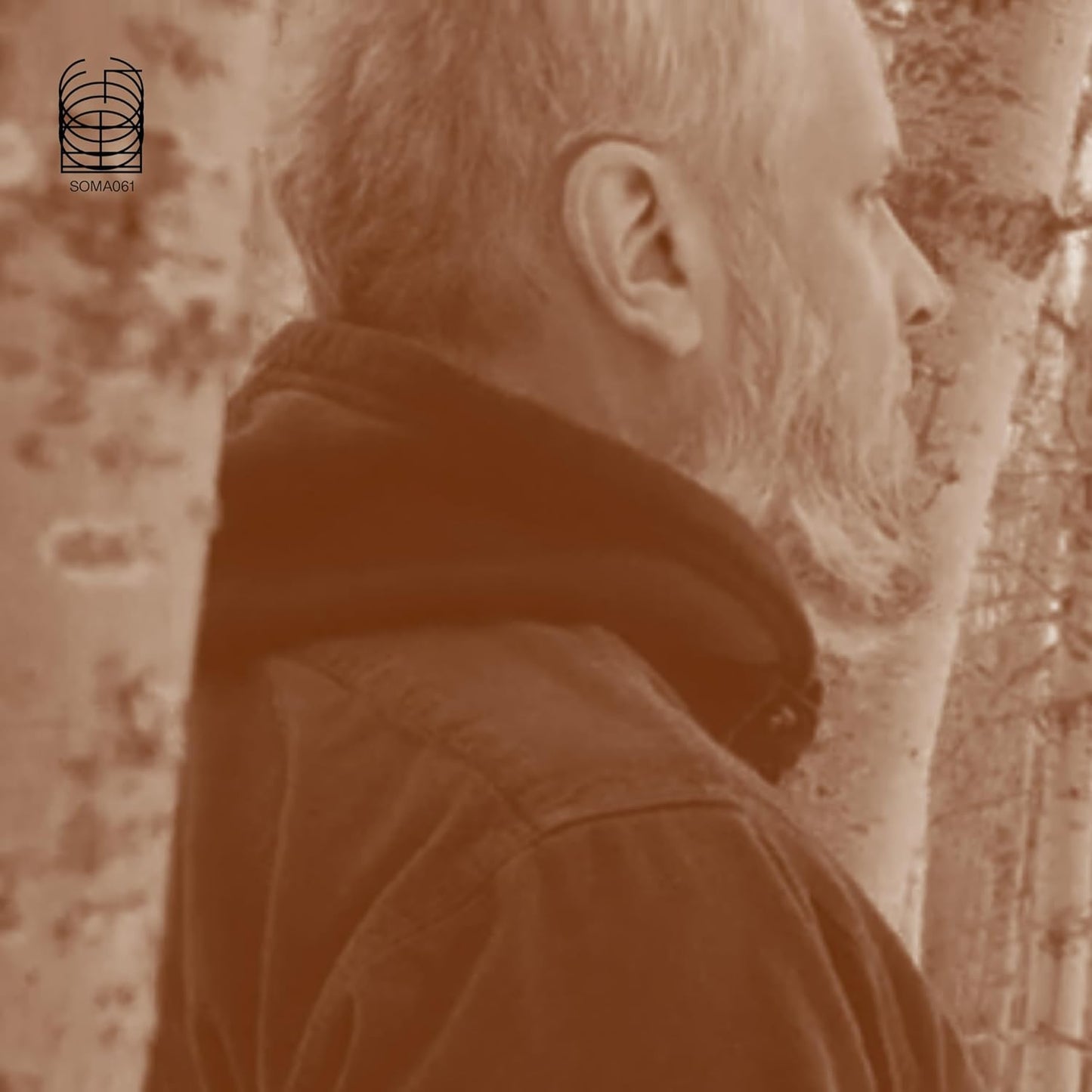 Sepia-toned CD cover featuring a profile of a man in a jacket.