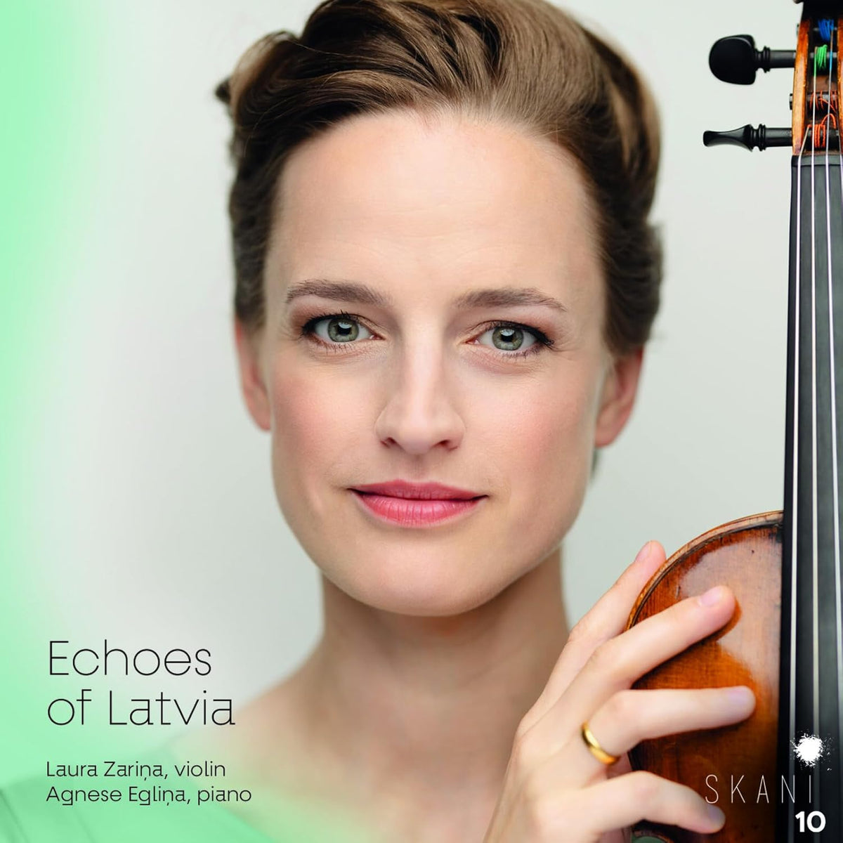 Woman with violin, album cover for "Echoes Of Latvia" by Laura Zarina.