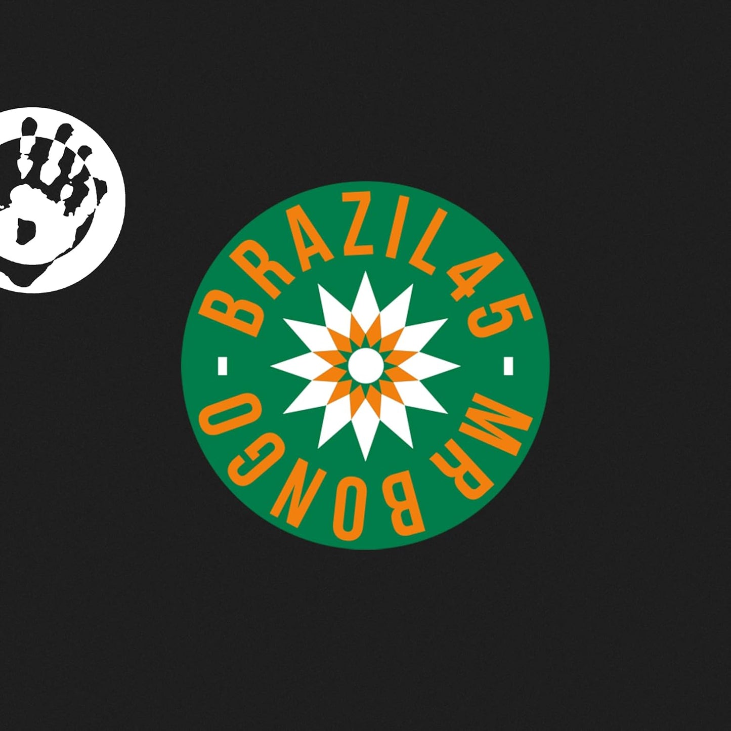 Vinyl record label with green and white starburst design, handprint.