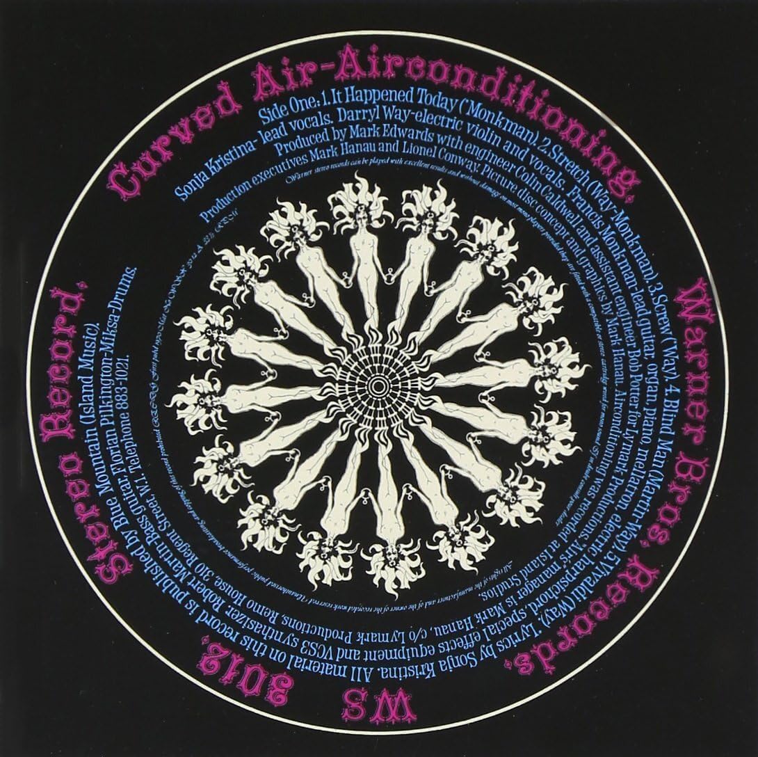 Vinyl record with sunburst yellow and red pattern, displaying song and artist details.