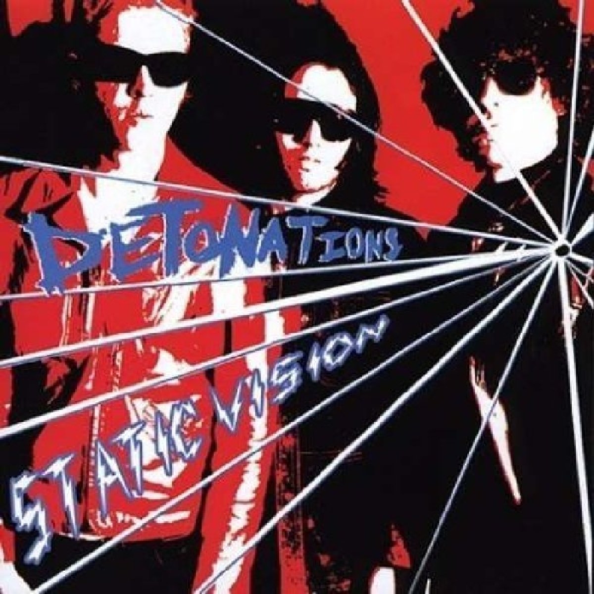 Album cover featuring three figures with sunglasses and cracked glass effect.