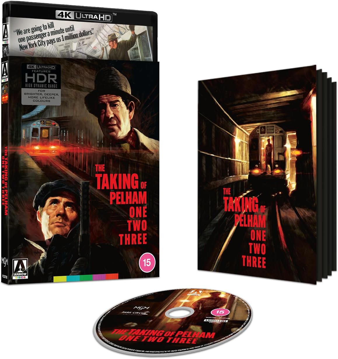 Blu-ray cover for "The Taking of Pelham One Two Three" featuring a man with a gun.