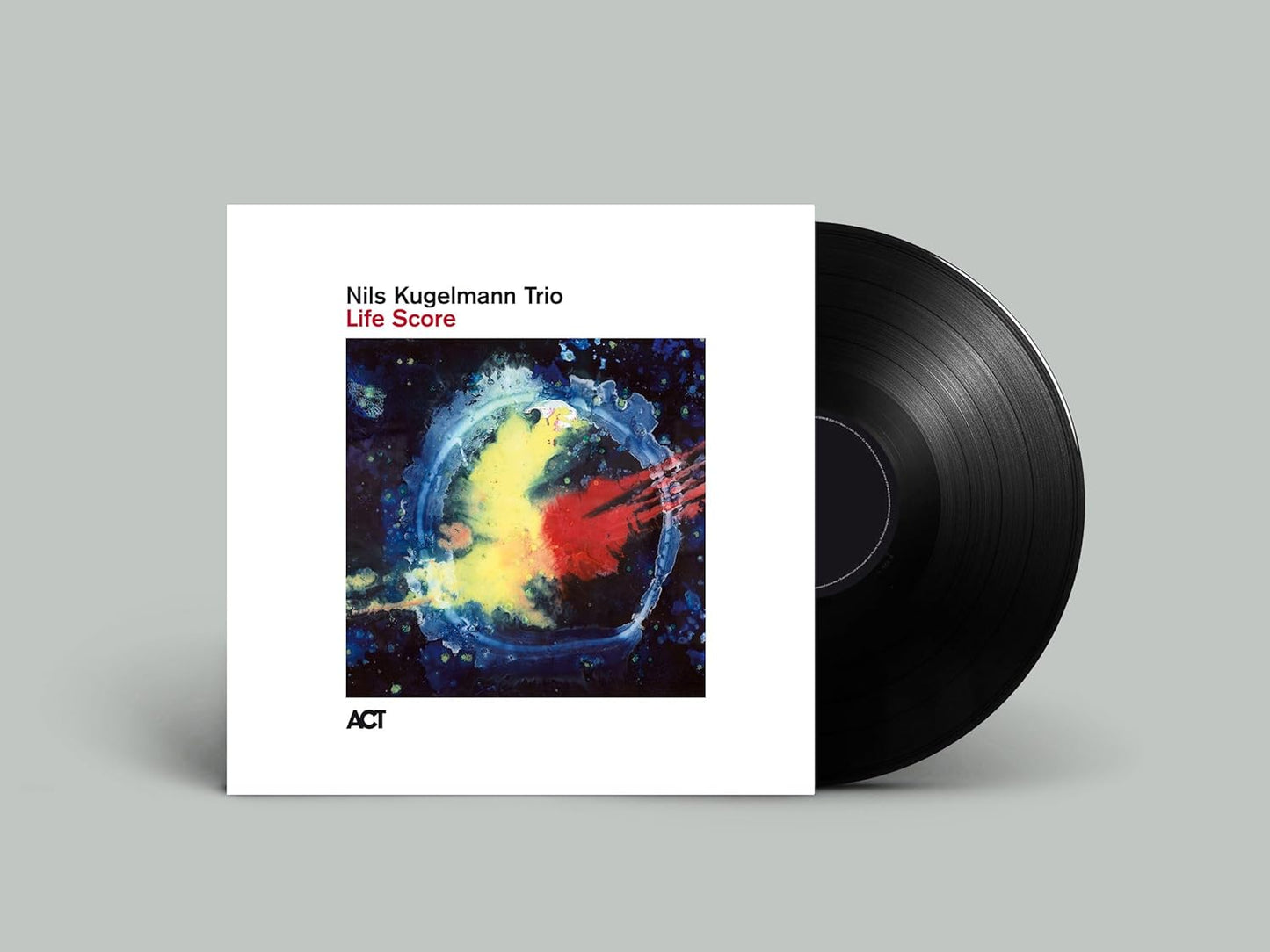 Vinyl record with abstract, colorful cover art and white text.