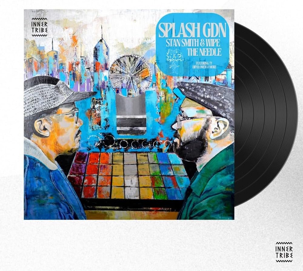 Vinyl record with painted cover art depicting two men and a cityscape.