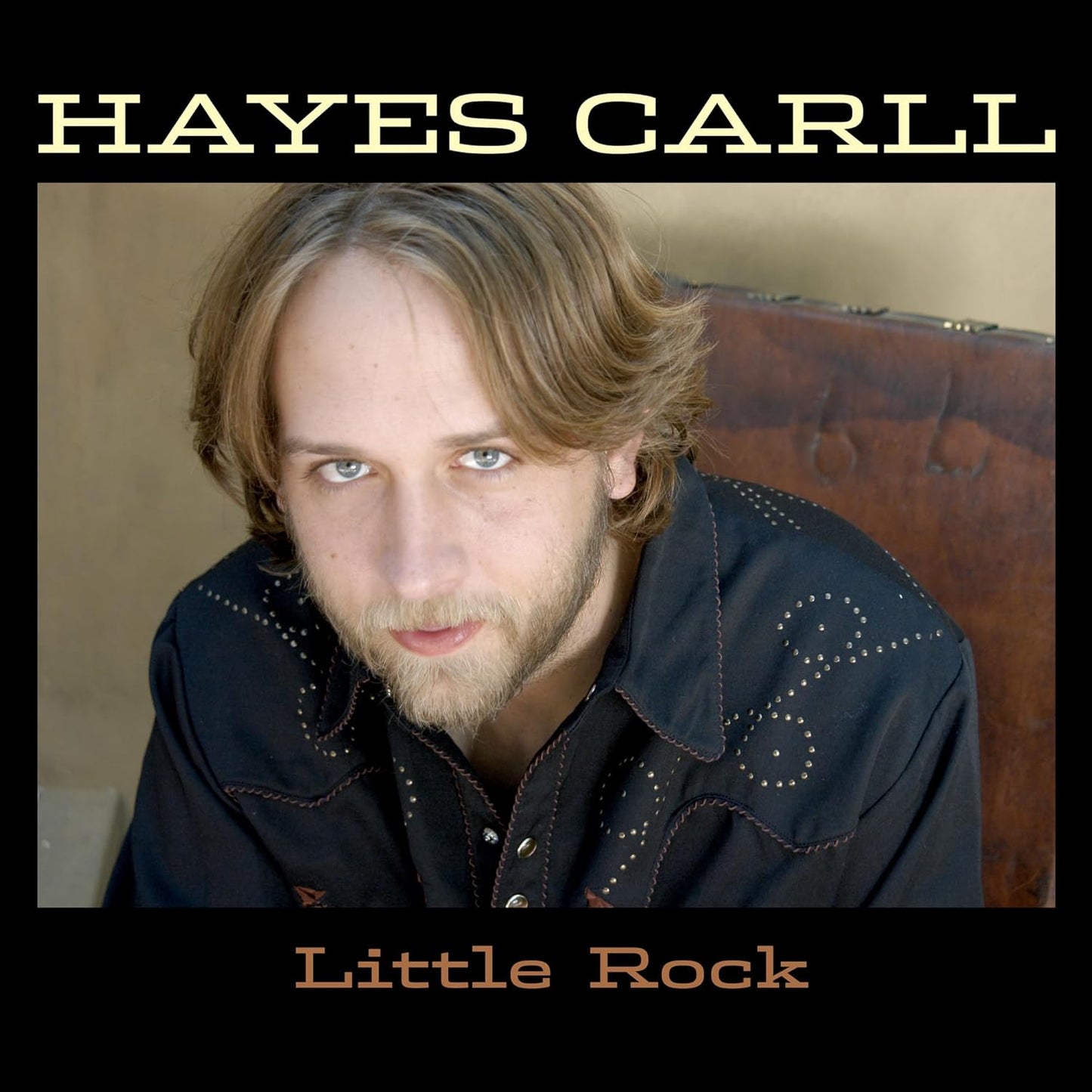 Hayes Carll album cover, "Little Rock," featuring a portrait of the artist.