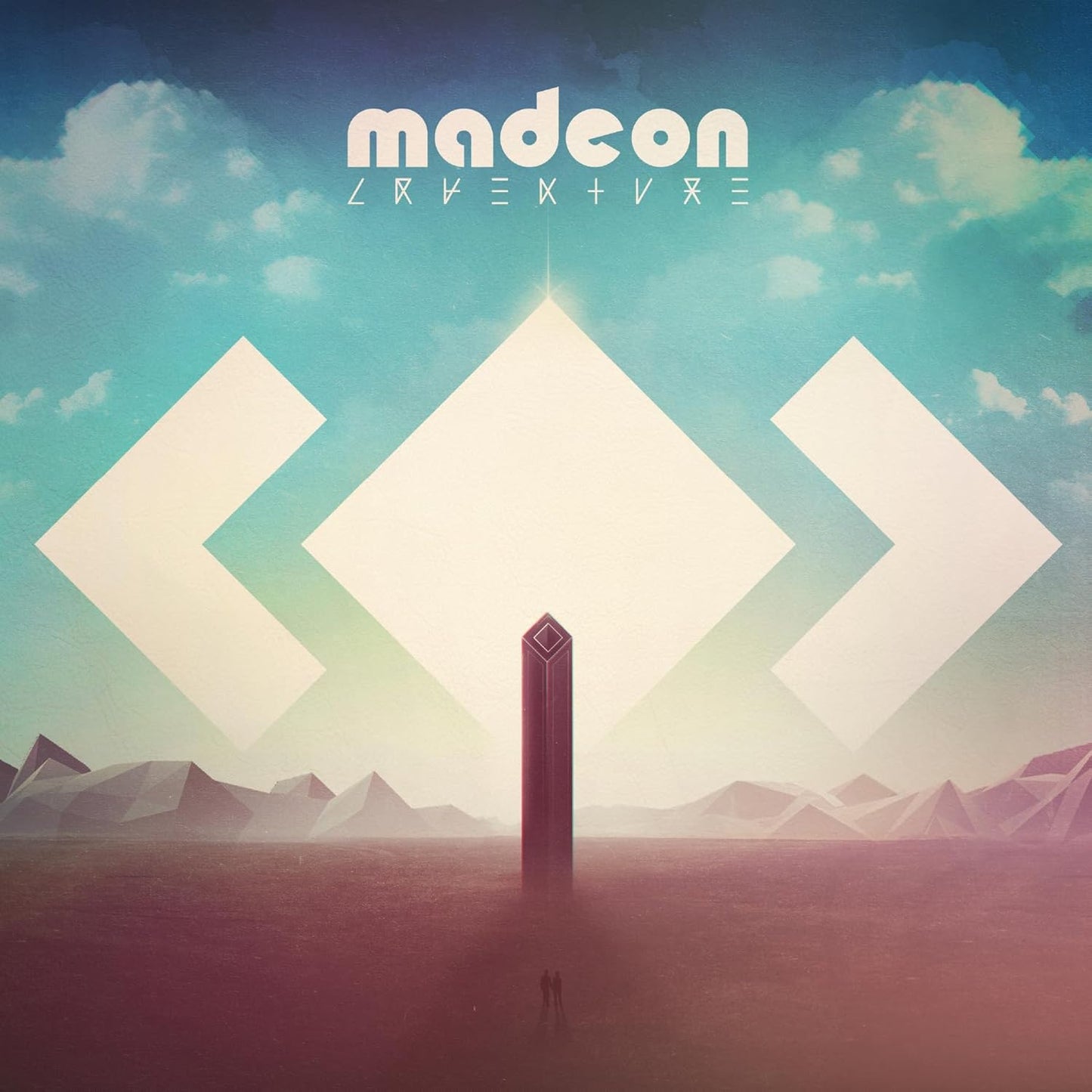 Album cover showing a tall monolith in a desert landscape under a blue sky.