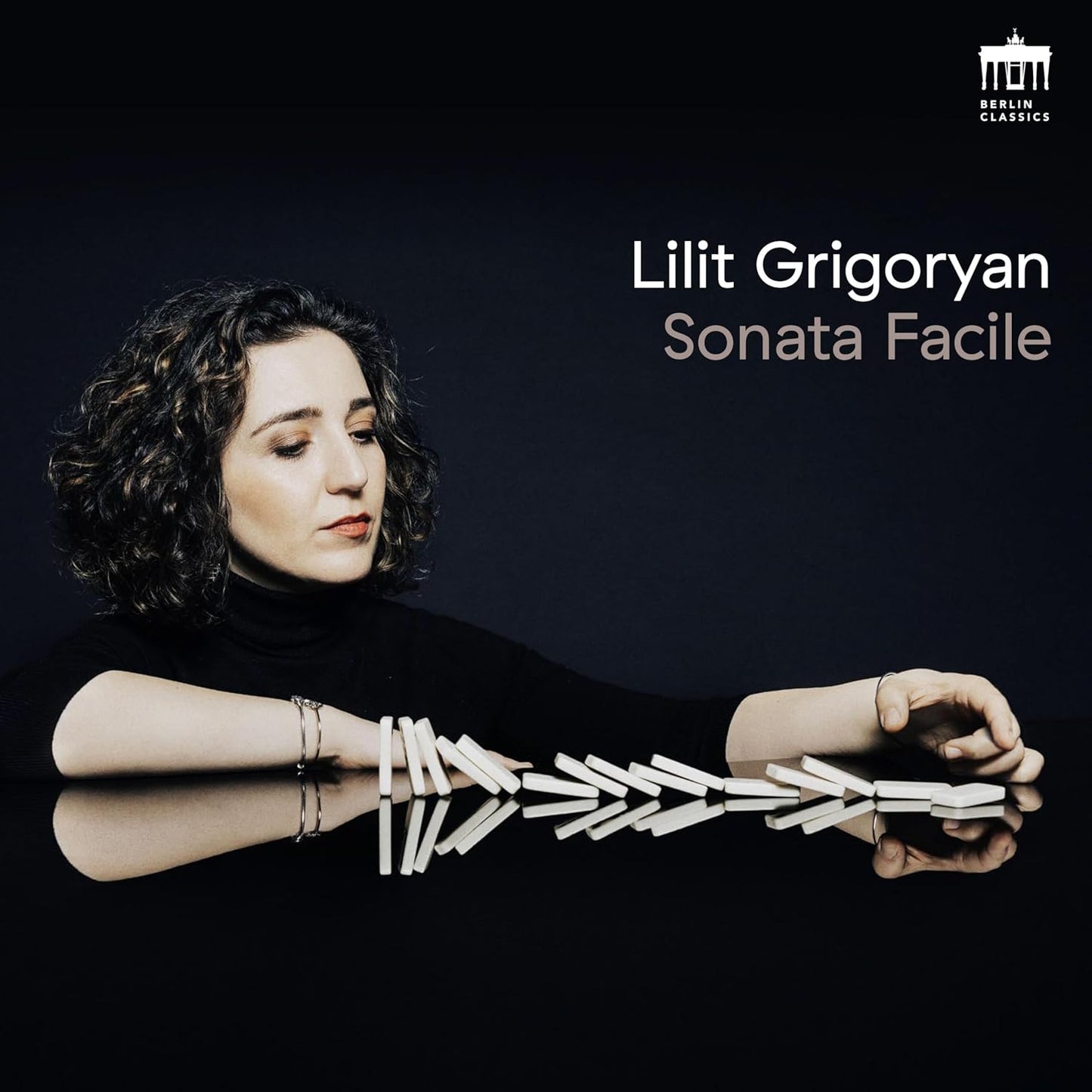 CD cover featuring pianist Lilit Grigoryan with interlocking white blocks.