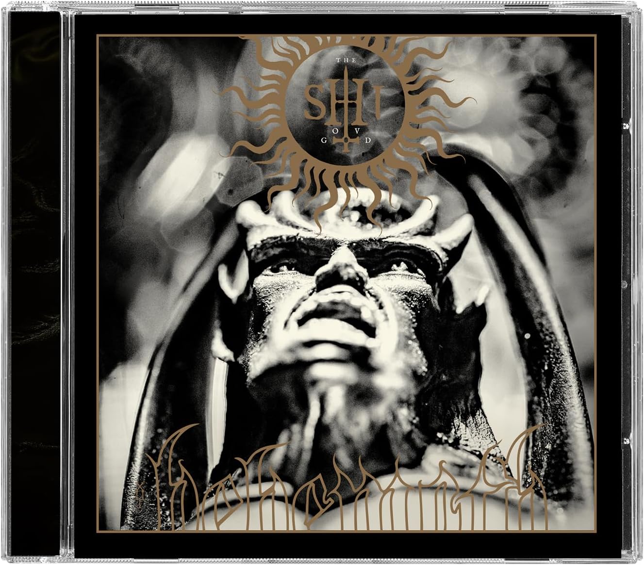CD cover: dark, dramatic portrait with golden sunburst and text.