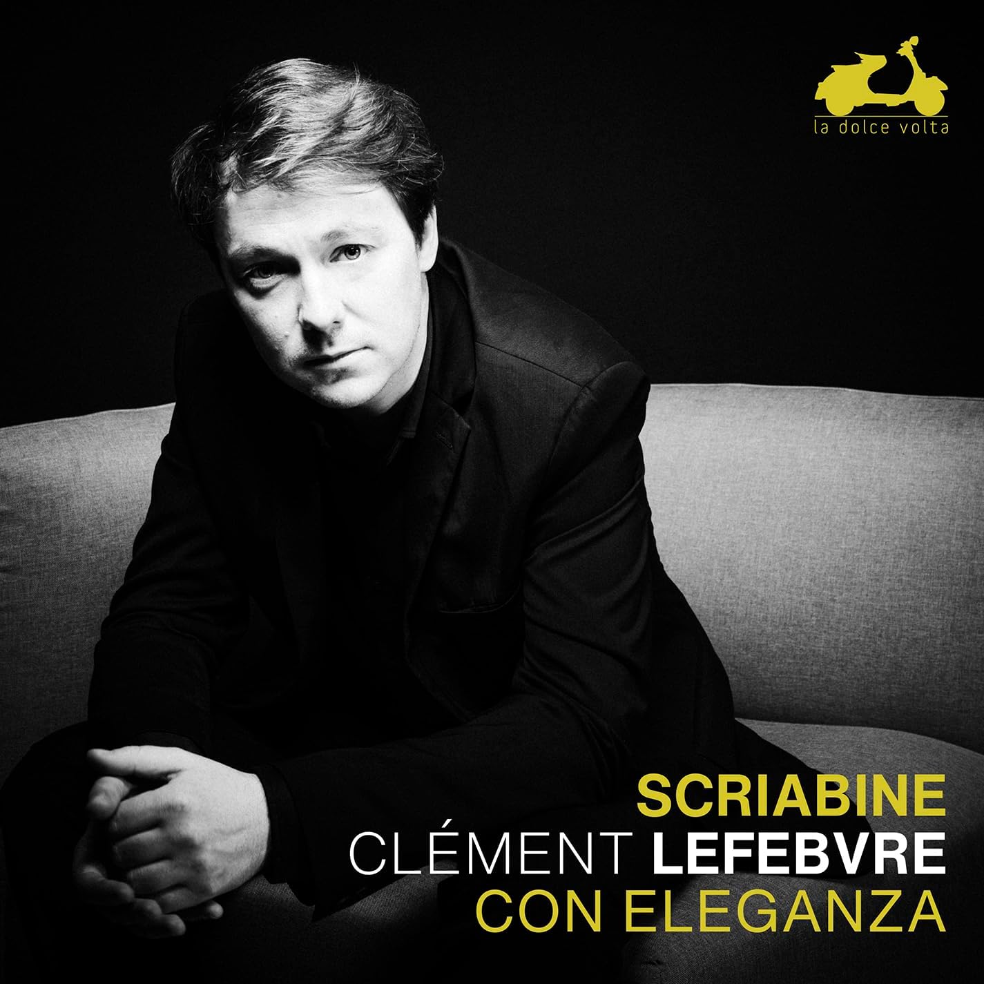 Black and white portrait of a man in a suit, album cover art.