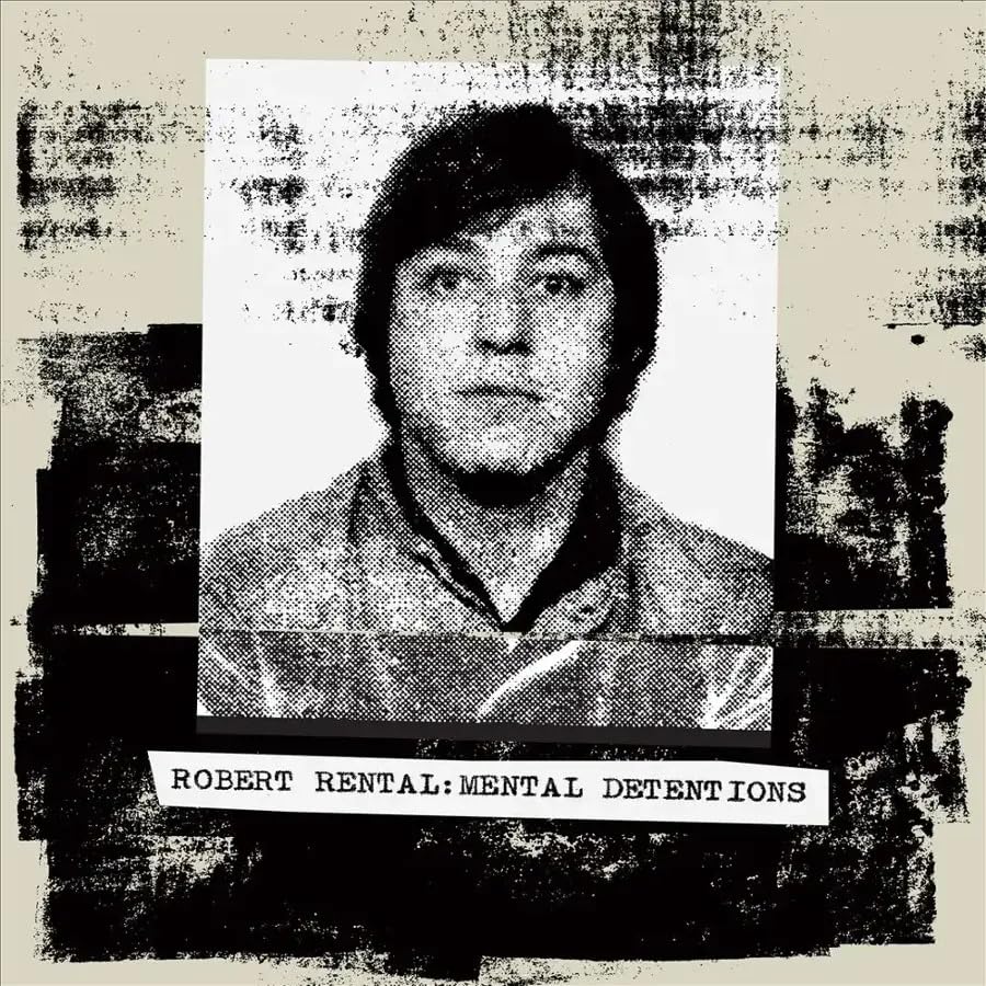 Black and white portrait of a man, resembling a mugshot, with text below.