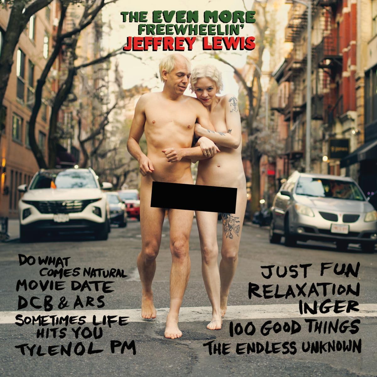 Two shirtless men walking on a city street, album cover art.