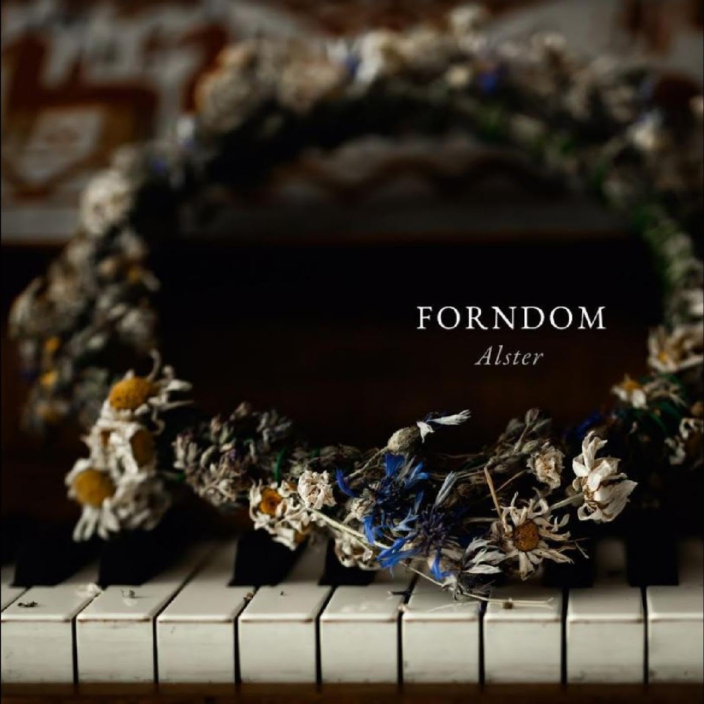 CD cover: "Forndom - Alster" with dried flowers on piano keys.
