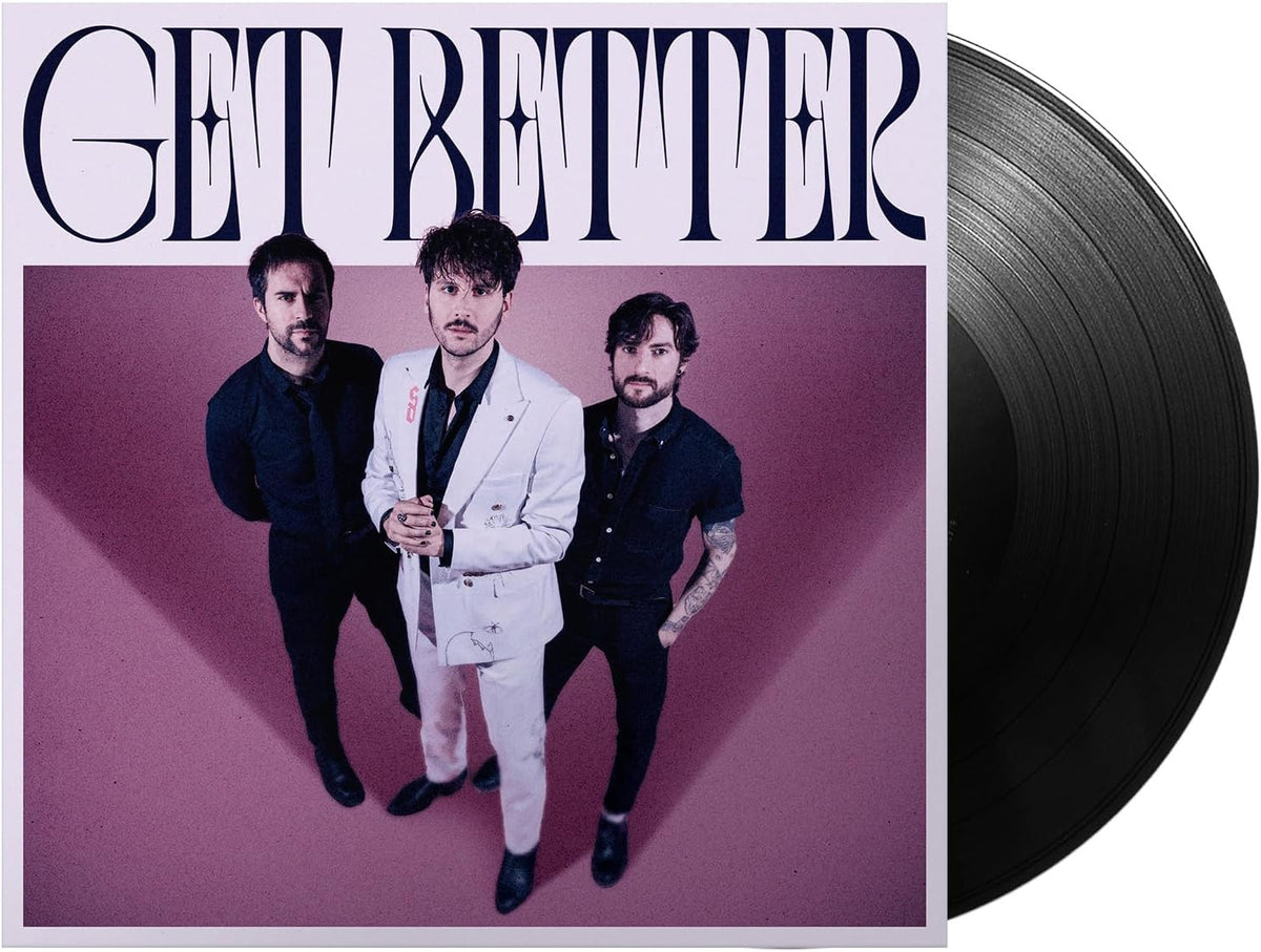 Vinyl record with album cover featuring three men in suits.