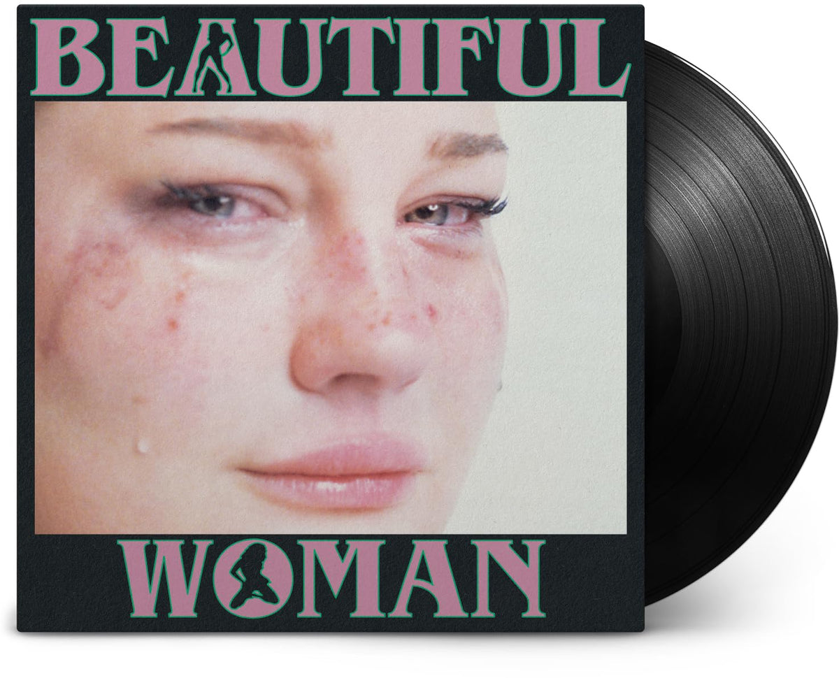Vinyl record with cover featuring a close-up portrait of a woman.