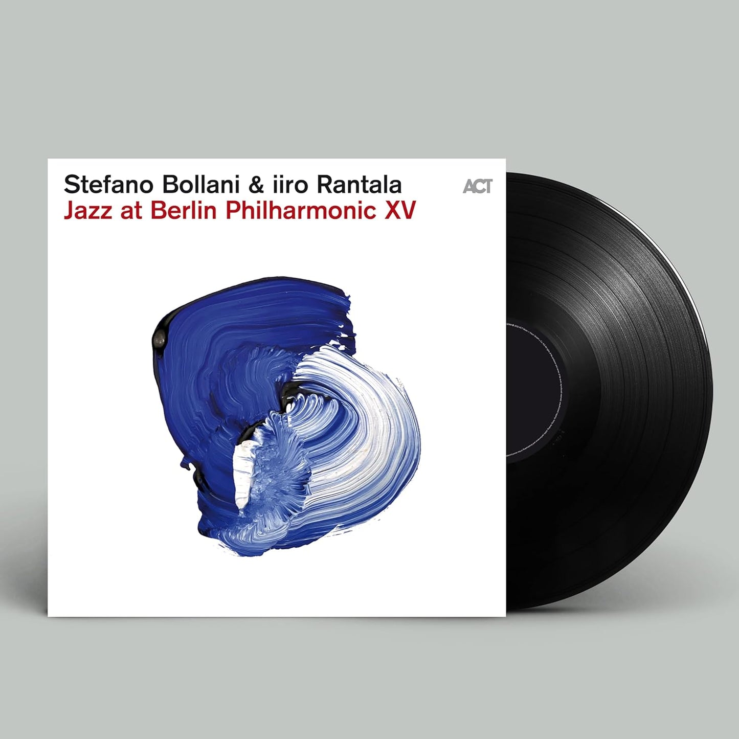 Vinyl record cover with blue and white abstract paint swirl and black vinyl disc.