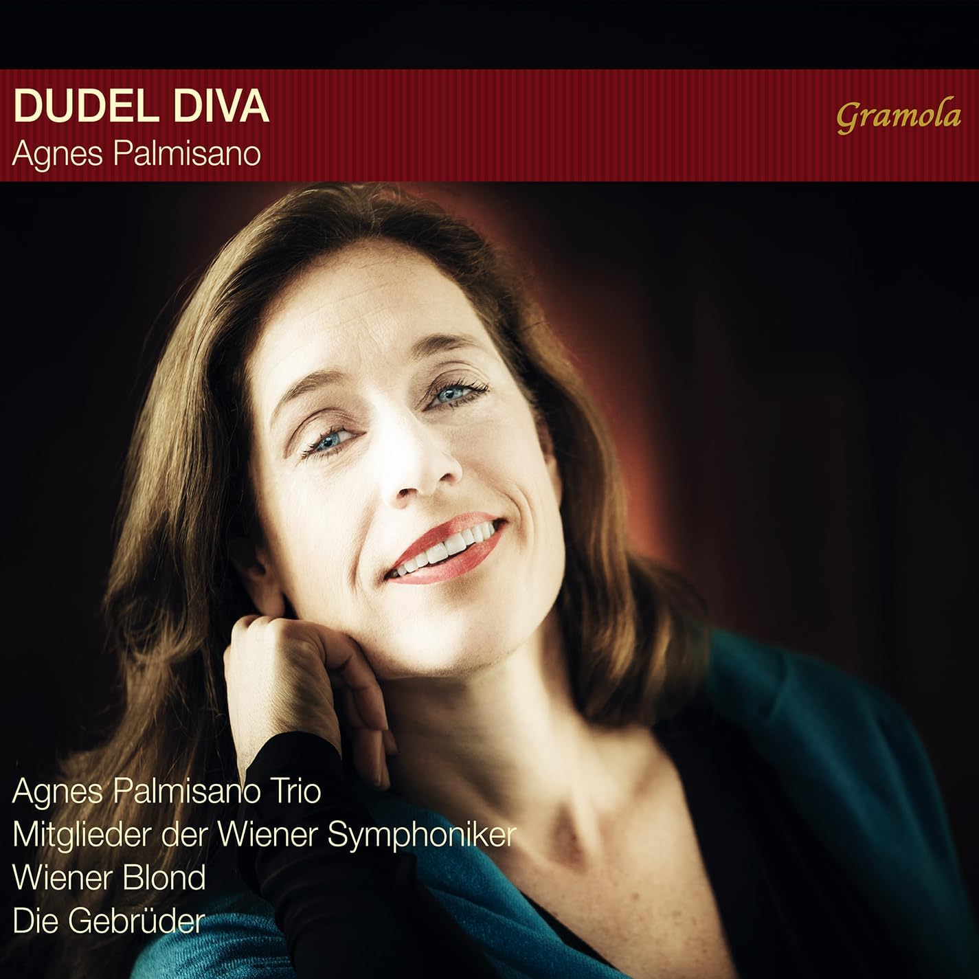 CD cover featuring a smiling woman, Agnes Palmisanio, with red accents.