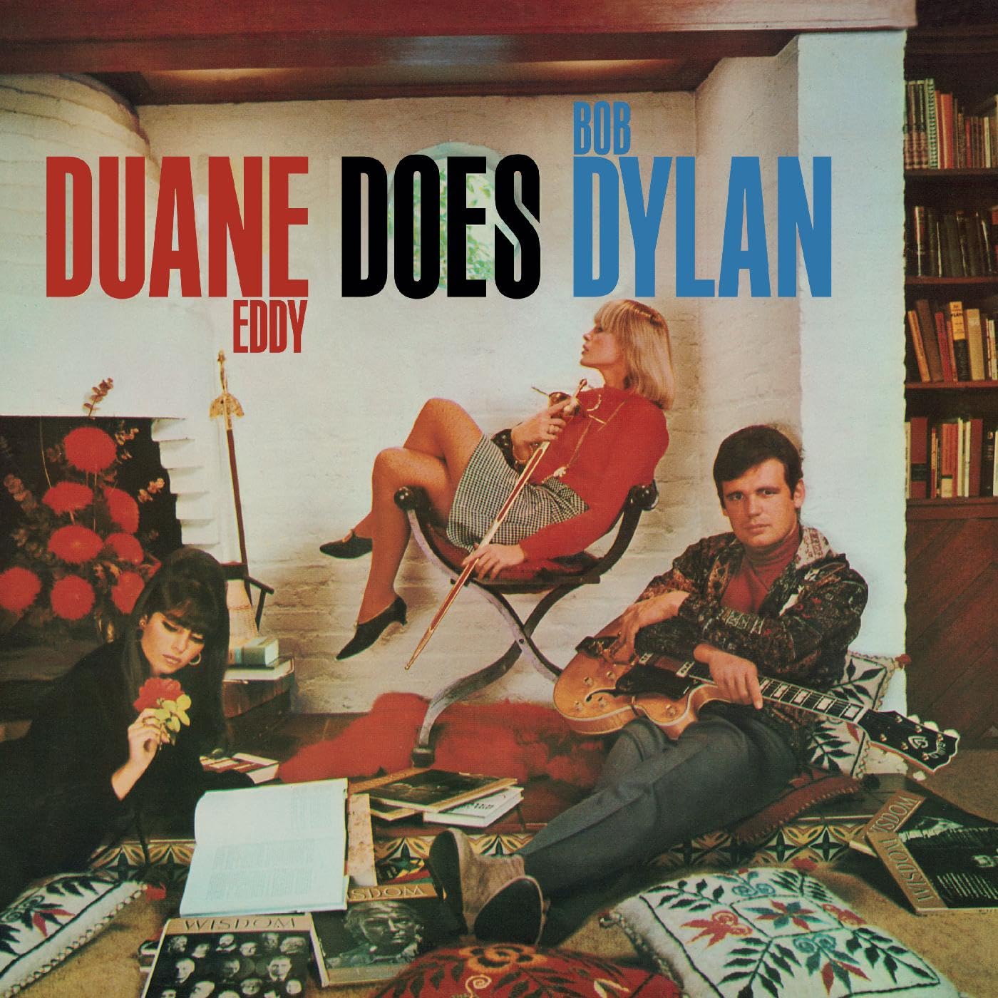 Album cover: Duane Eddy Does Dylan, featuring musicians in a living room.