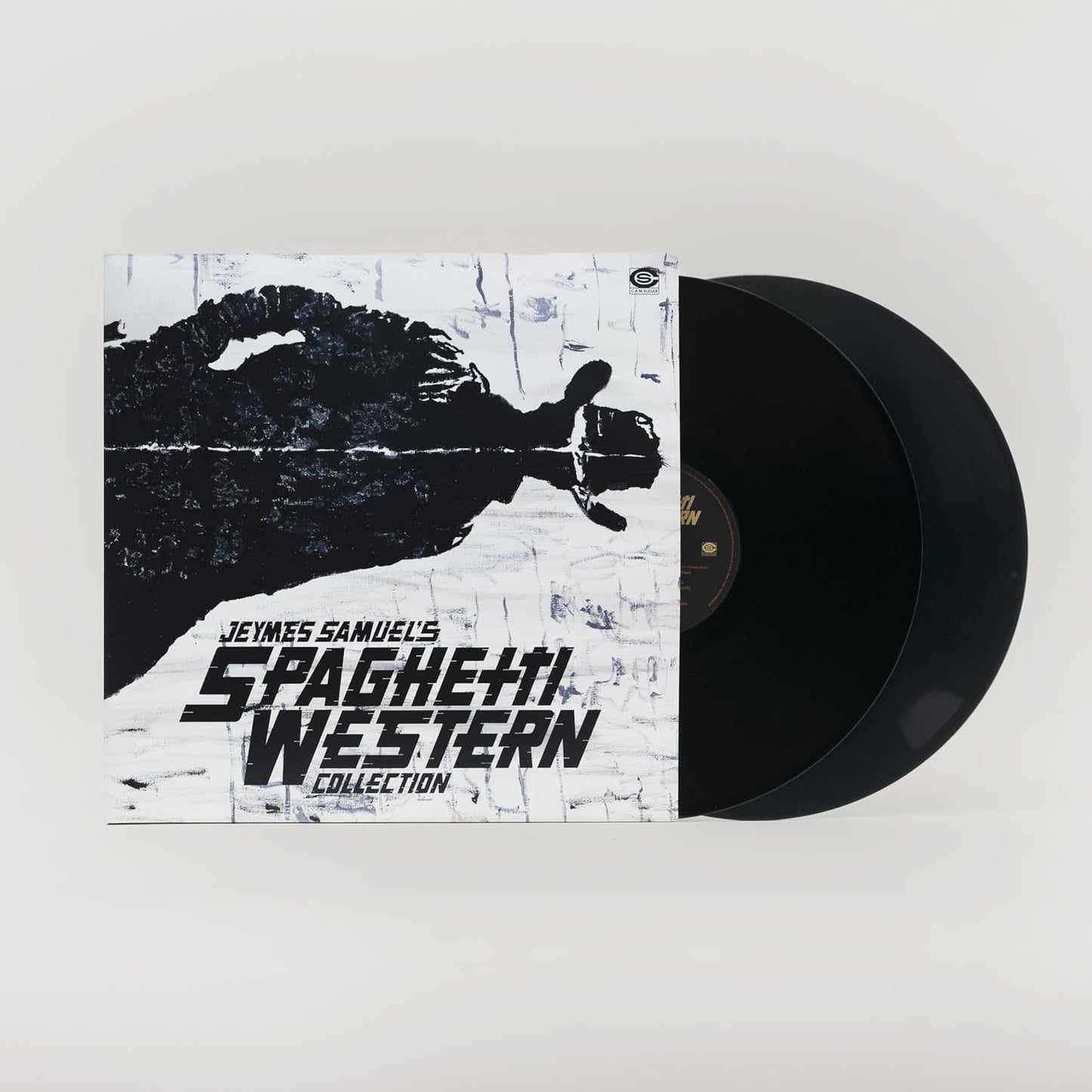 Vinyl record with white cover featuring a silhouetted figure and title.