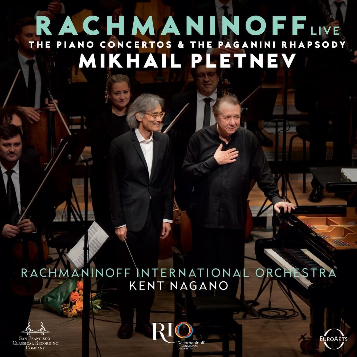 Orchestra with pianist Mikhail Pletnev, album cover for Rachmaninoff live recording.
