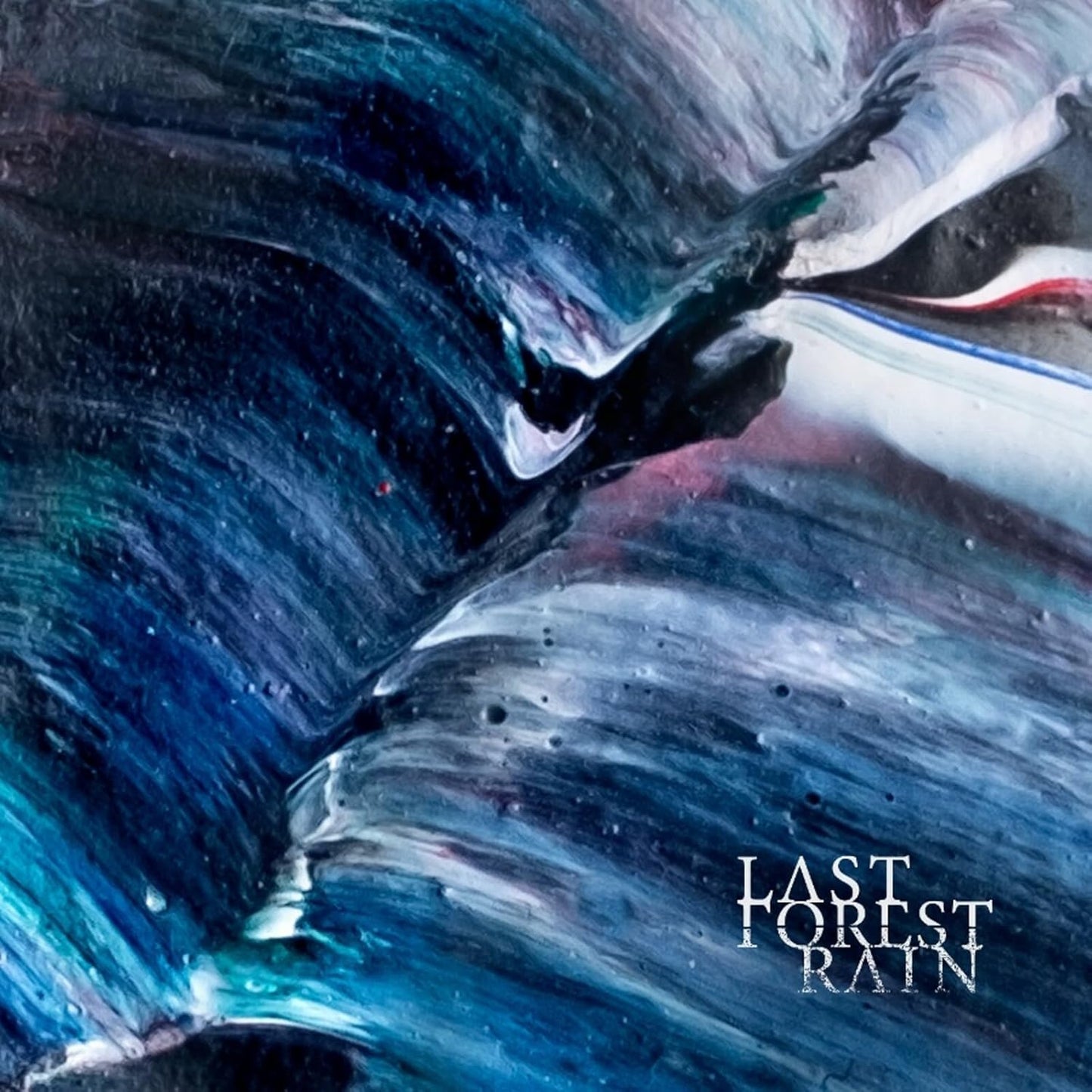 CD cover with abstract blue and white paint resembling water.